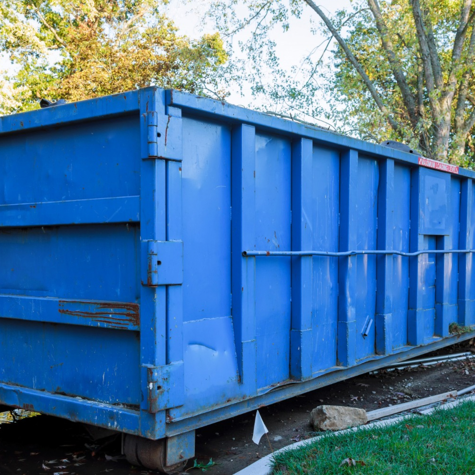 roll-off-dumpster-filled-with-building-rubble