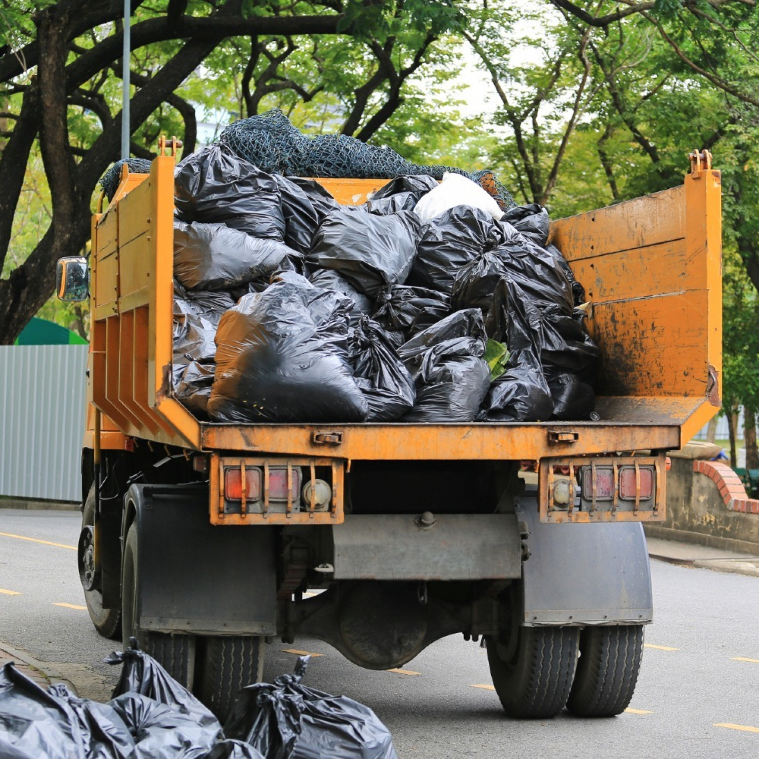 garbage-truck-with-loading-waste-park-garden