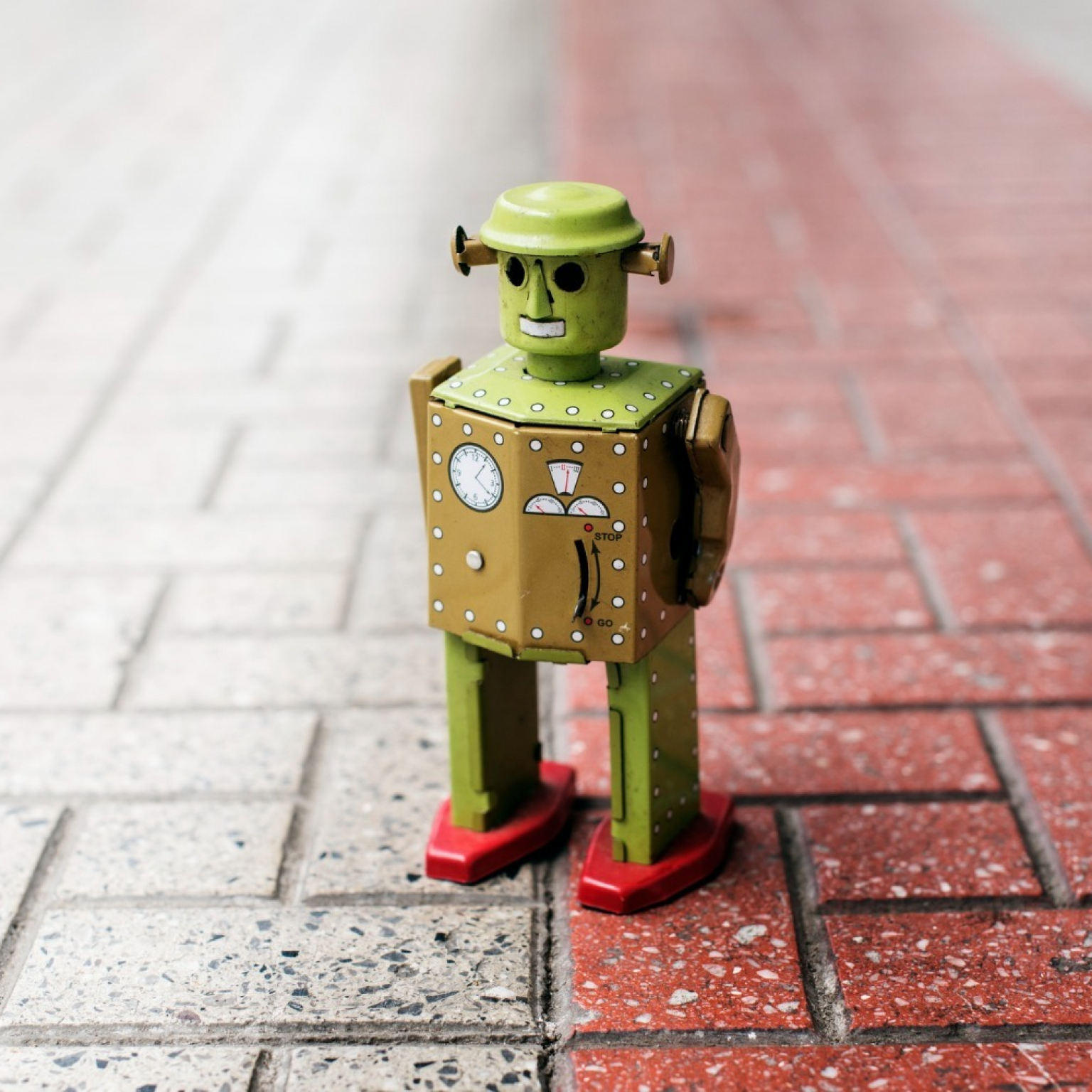 retro-tin-robot-toy-standing-ground-with-pattern