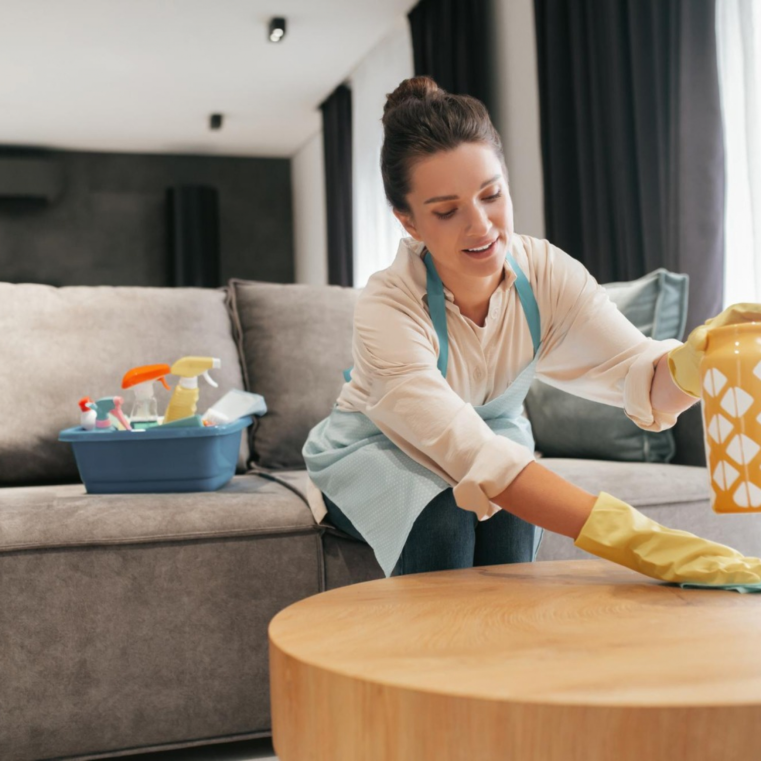 chores-woman-cleaning-table-surfcase-with-disinfector