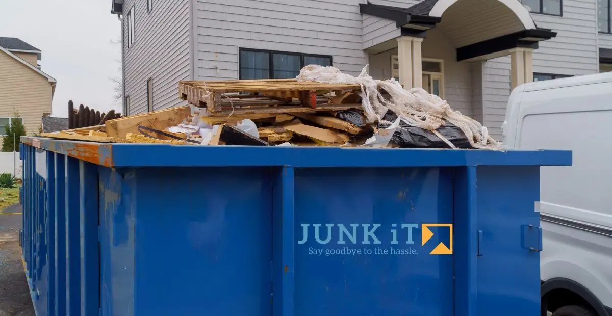 Junk It's loaded garbage bin, ready for pickup. Need efficient waste disposal? Choose bin rental services in Calgary today
