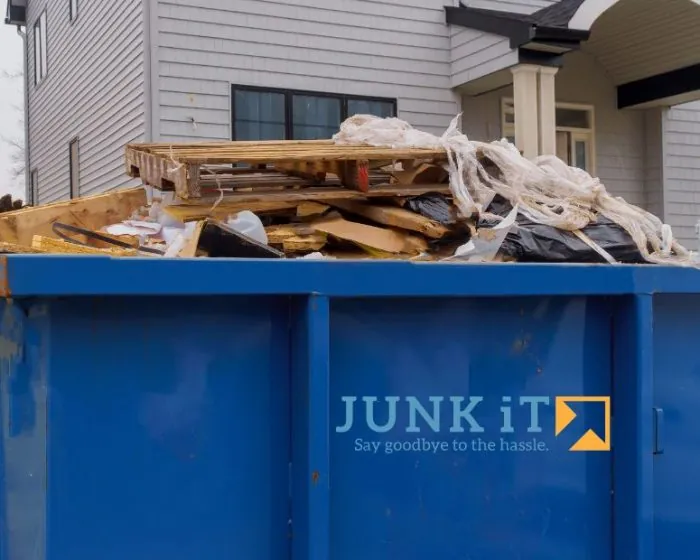 Junk It garbage bin filled with garbage and trash - making it easy for you to dispose of waste with hassle-free garbage bin rental in Scarborough