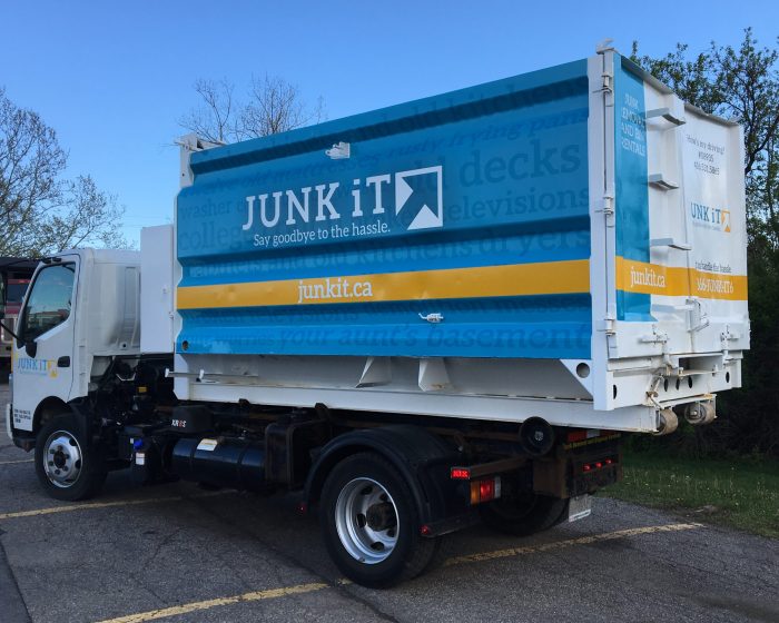 a Junk It dumpster truck - junk it dumpster and bin rental at your service ready to deliver in Canada