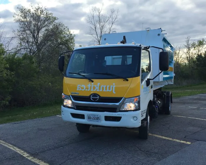 Junk It Dumpster Truck ready for efficient garbage bin rental in Vancouver - helping you clear out your space effortlessly