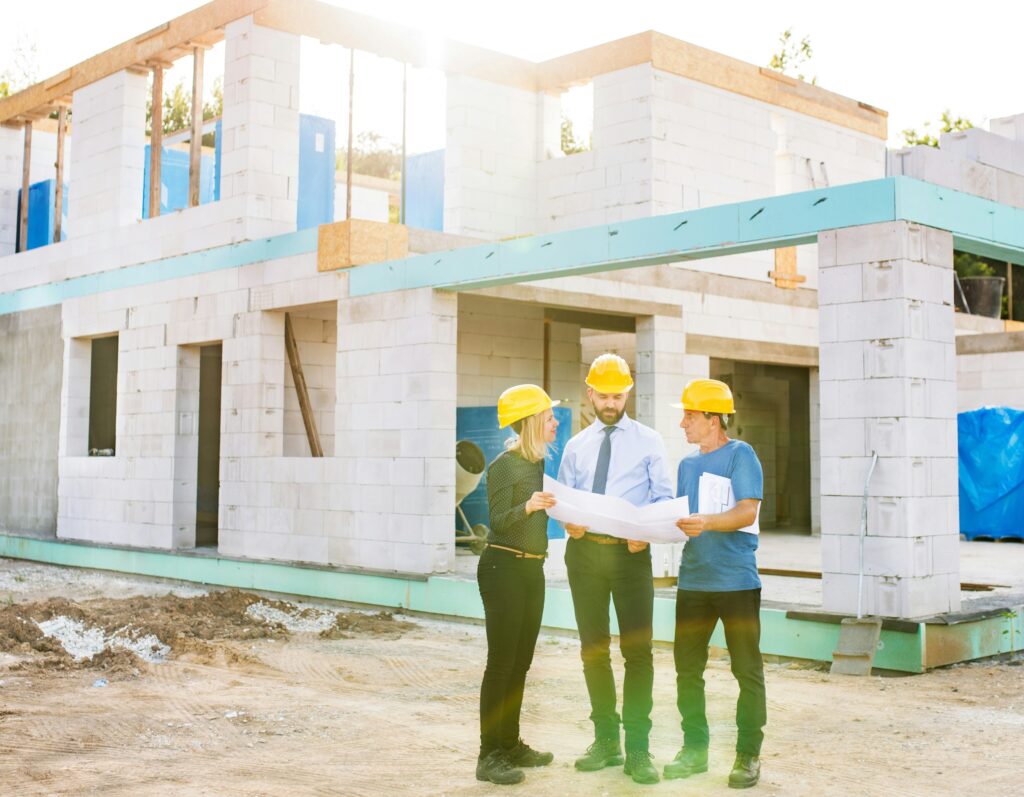 a building under construction - get Junk It's stress free commercial garbage bin rental services in Canada