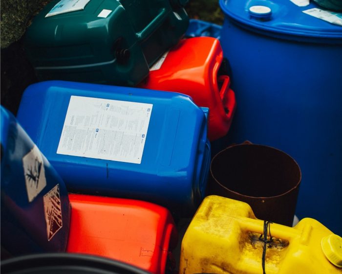 A pile of empty plastic gallon jugs and containers - ready for disposal with reliable garbage bin rental in Scarborough