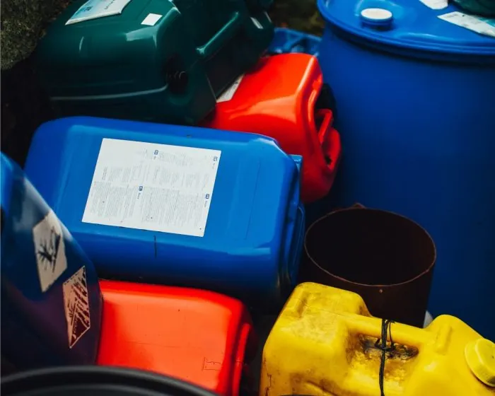 pile of empty plastic gallon jugs and containers—get rid of them easily with bin rental services in Brampton