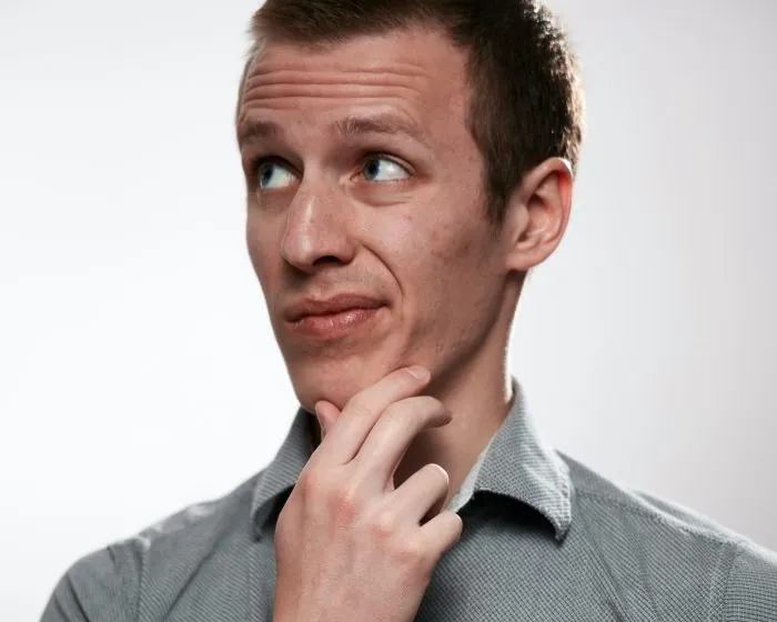 a man thinking about his waste management needs - Consider Junk It's bin rental in Cambridge for a convenient solution