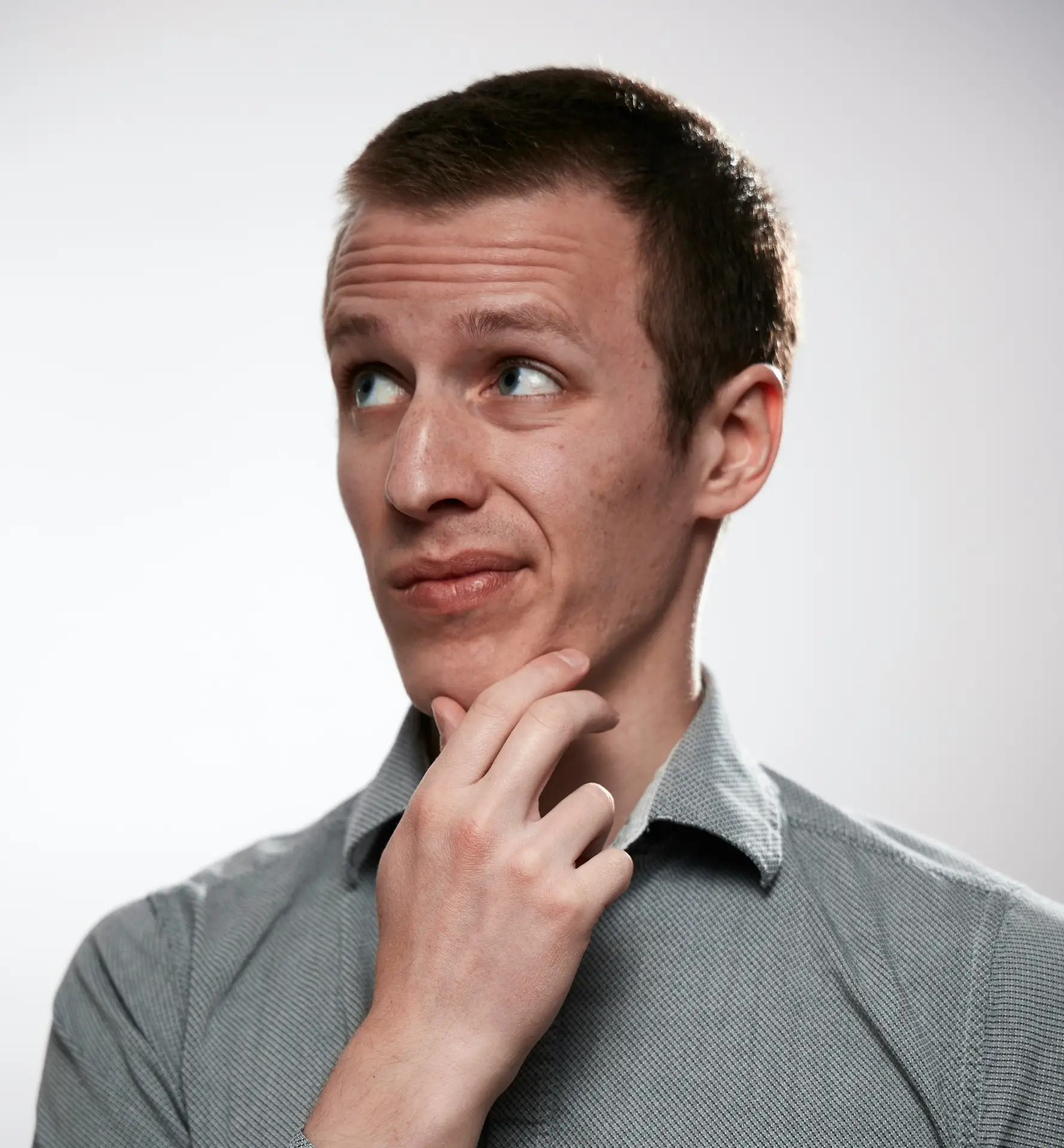 A man thinking about how convenient his next cleanup could be with reliable bin rental in Kitchener for efficient waste disposal